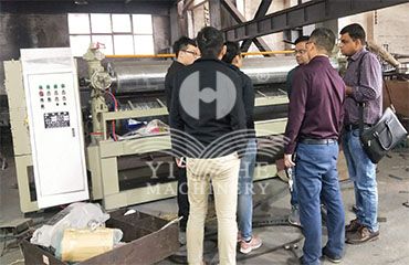 Indian customers visit our factory to buy glue spreader machine